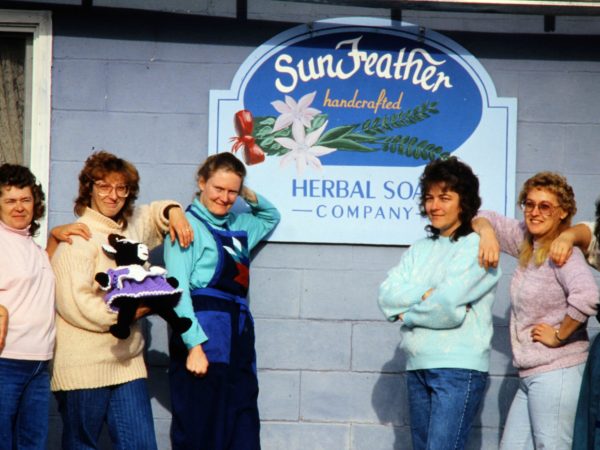 Employees in front of Sunfeather Soaps in Parishville