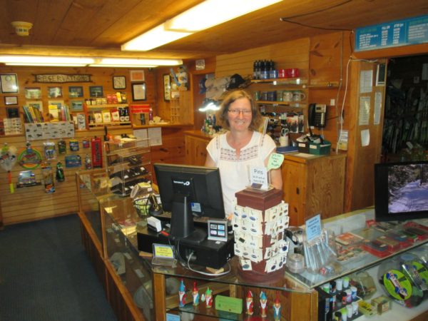 Kathy Zahray at the register of the Lapland Lake Nordic Vacation Center in Benson