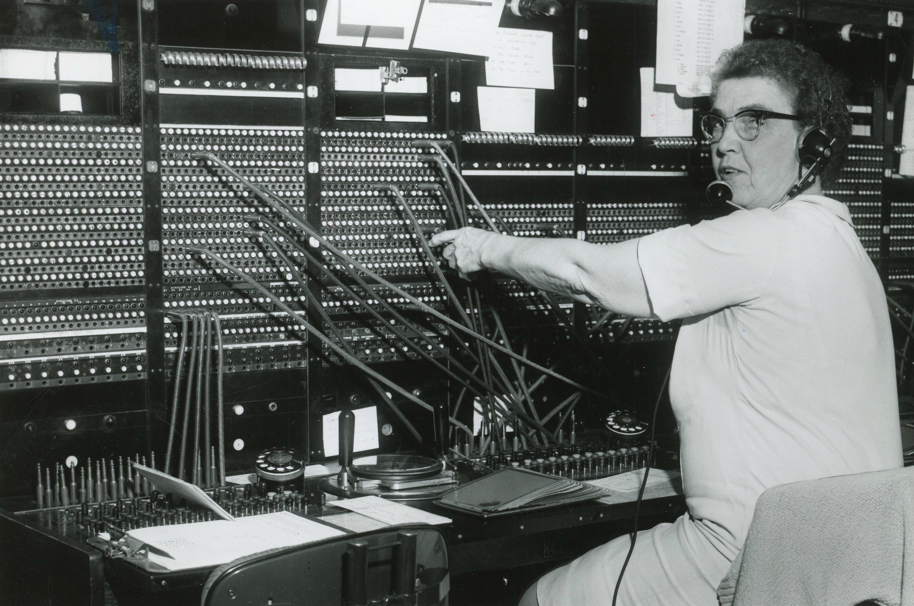 Erma Scholl working a telephone operation switchboard in Old