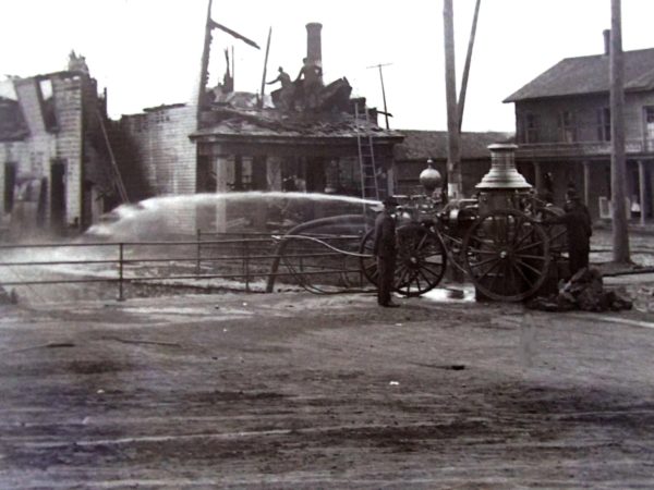 Volunteer fire department battles a fire in Dexter