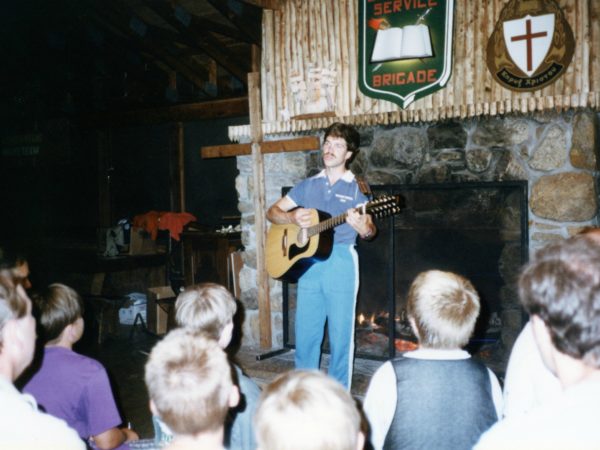 Keith Miller plays guitar at a worship service at Northern Frontier Camp in North River