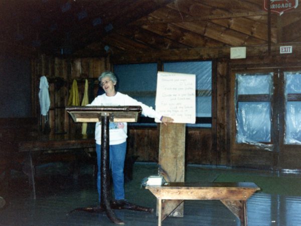 June McKenney gives staff orientation at Northern Frontier Camp in North River