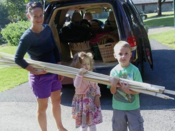 Shea Carr unloads basket-weaving supplies from her car in Blue Mountain Lake