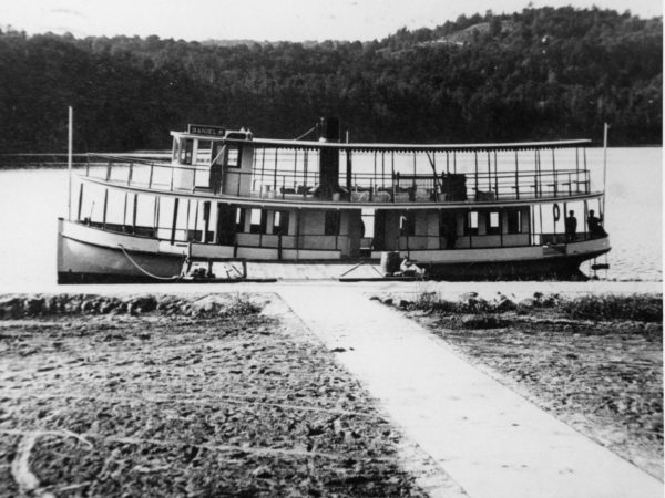 Steamboat tied up at the village dock in Long Lake