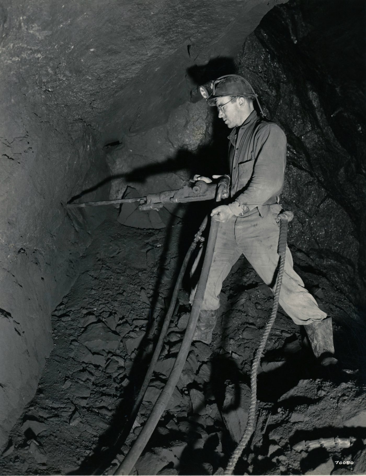 Miner uses airpressured drill in the mines in Lyon Mountain