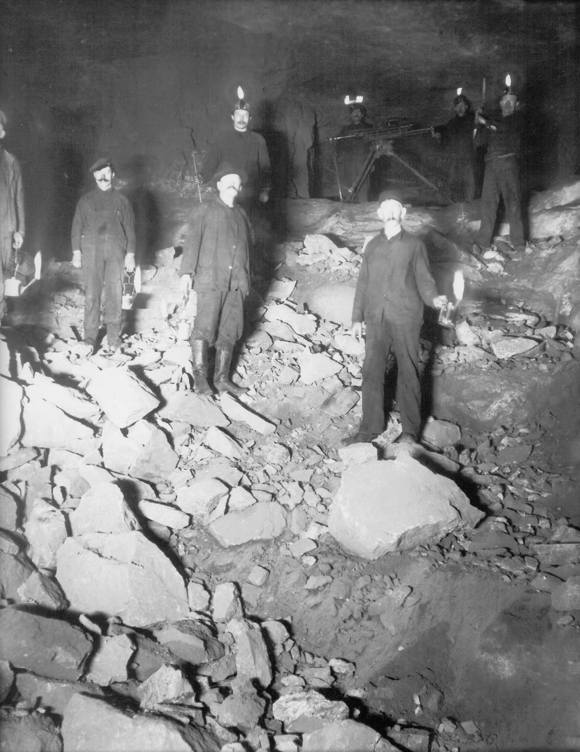Miners underground with oil lamps in Lyon Mountain