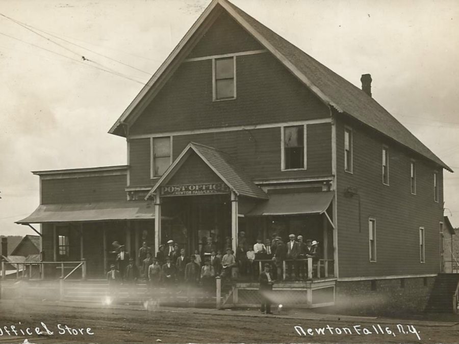 Interior of post office with employees in Morristown