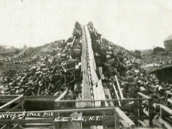 Pulpwood conveyor and stockpile at the paper mill in Newton Falls