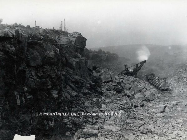 A mountain of ore in the pit at Benson Mines