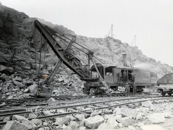 Men with a Bucyrus rail mounted steam shovel in Benson Mines