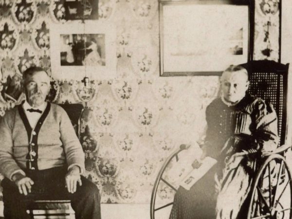 George and Sarah Bullock inside the post office in Wanakena