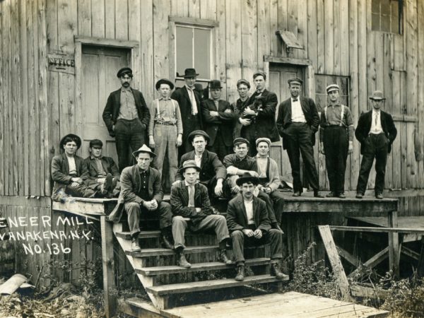 Workers on the steps of the veneer mill in Wanakena