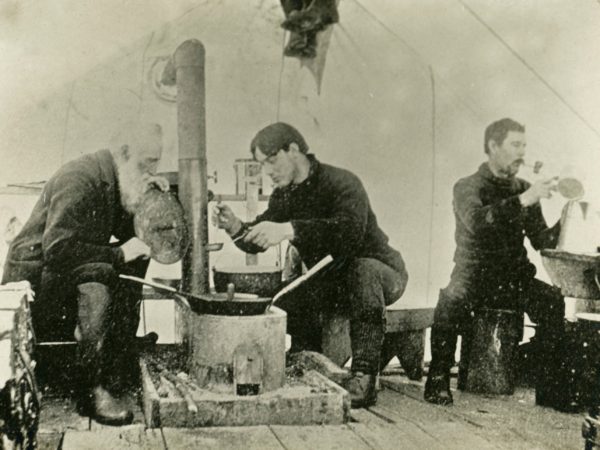 Workers on the steps of the veneer mill in Wanakena