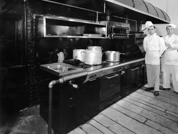 Chefs at cooking range in Clinton County