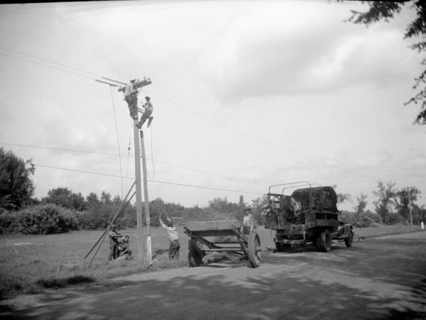 Men working on power lines in Clinton County