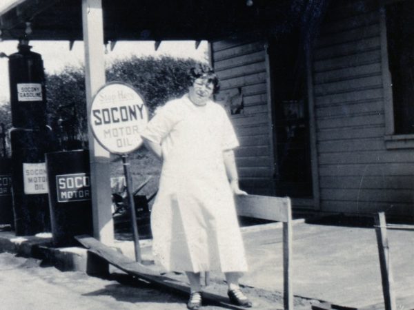 Grace LaParr in front of SUCONY gas station in Cranberry Lake