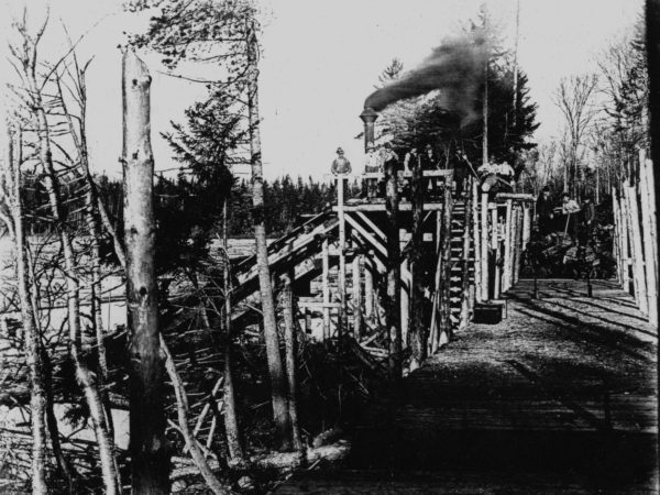 Log loader on the Oswegatchie River in Harrisville