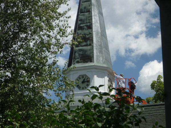 Marcy Neville painting a church in Keene Valley