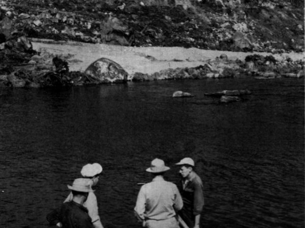 Surveying party taking measurements at Carry Falls