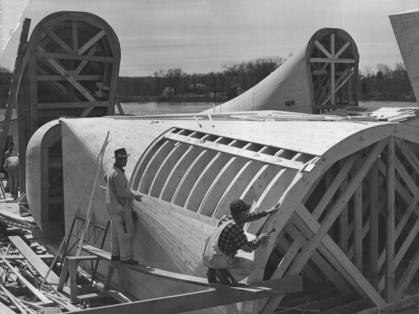 Two carpenters constructing a draft tube in South Colton