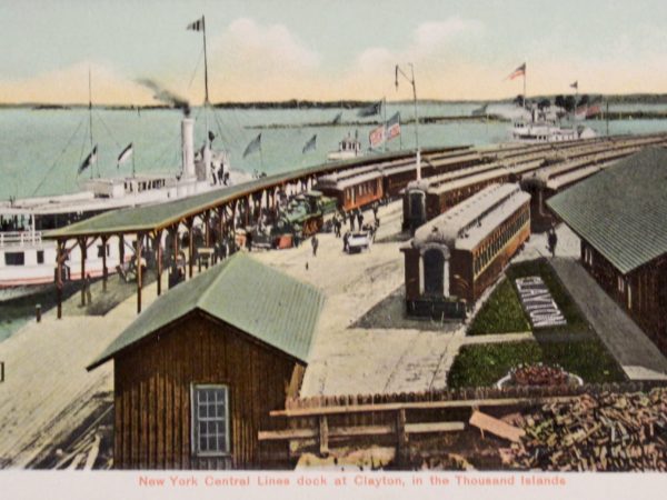 Postcard showing the train station and docks in Clayton