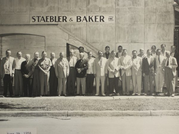 Workers outside Staebler and Baker in Clayton