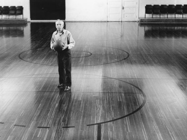 Janitor John Yerman in the gym of Town of Webb High School