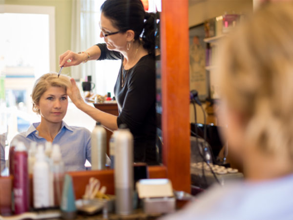 Hairdresser helping a customer in Old Forge