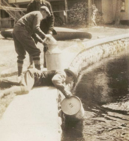 Stocking fish behind Parquet Hotel in Inlet