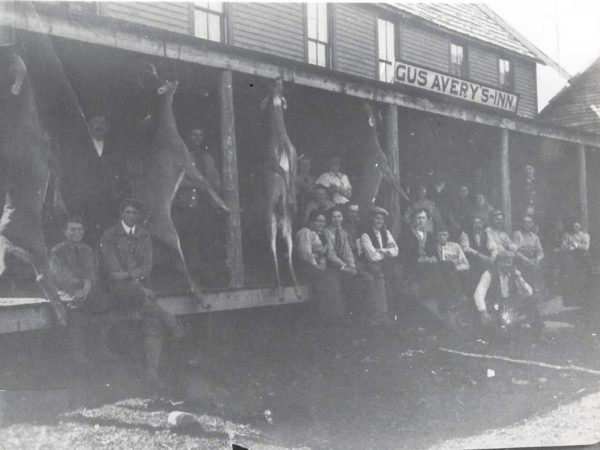 Hunters on the porch of Avery’s Inn in Piseco