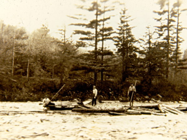 Log driving on the river in Hope