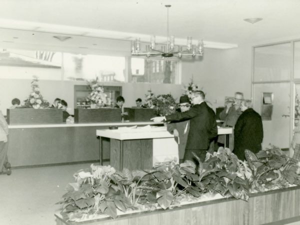Patrons and tellers inside the St. Lawrence National Bank in Carthage