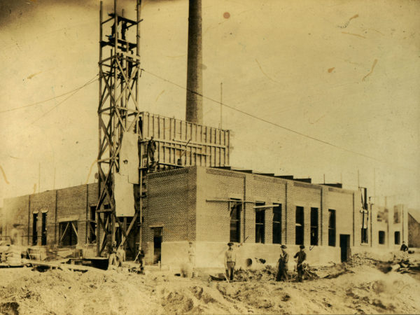 Construction of an Island Paper Company building in Carthage