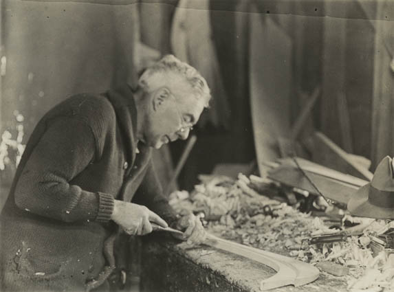 Wallace Emerson working on boat rib in Long Lake