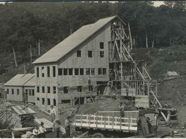 Putting siding on the American Glue Company mill in Minerva