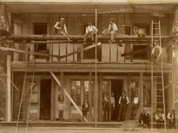 Building an addition on the post office in New York Mills