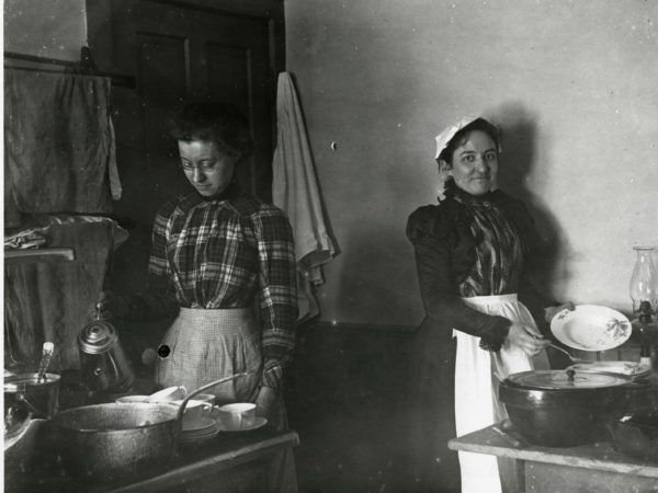 Women working in kitchen in Saranac Lake