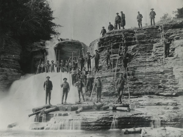 Loggers with pikes at Kings Falls on Deer River in Denmark