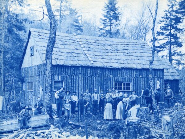 Crew of J. Schriner’s lumber camp with their families in Morehouse