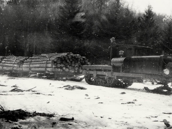 Hauling logs with a Lombard Log Hauler to Partlow in Long Lake