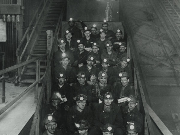 Miners in man cages at Republic Steel Company mine in Mineville