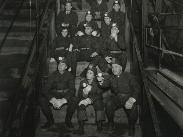 Men and women ready to be lowered into Republic Steel Company mine in Mineville