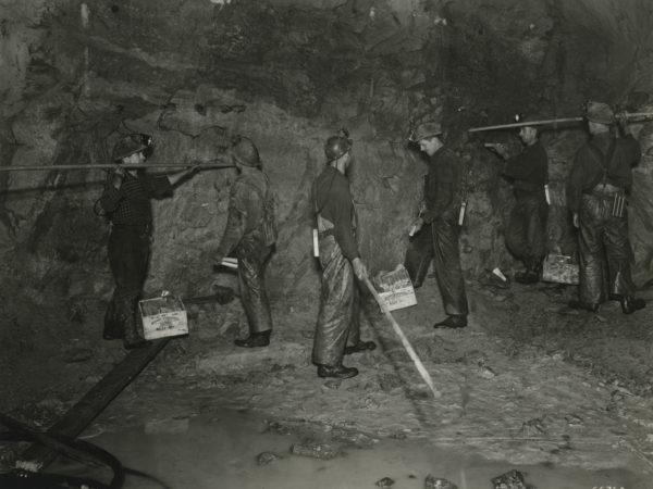 Miners set explosives inside a Republic Steel Company mine in Mineville