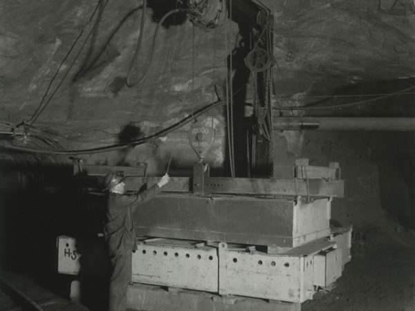 Bert Bruno operates hoist inside a Republic Steel Company mine in Mineville