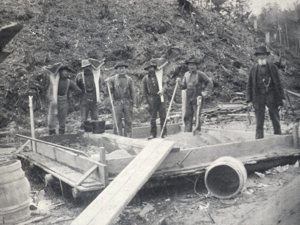 Sifting crushed rock at Barton Mines in North River