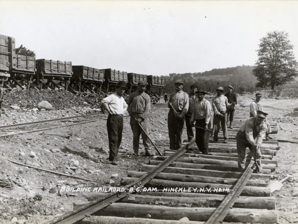 Building the railroad by the barge canal dam in Hinckley