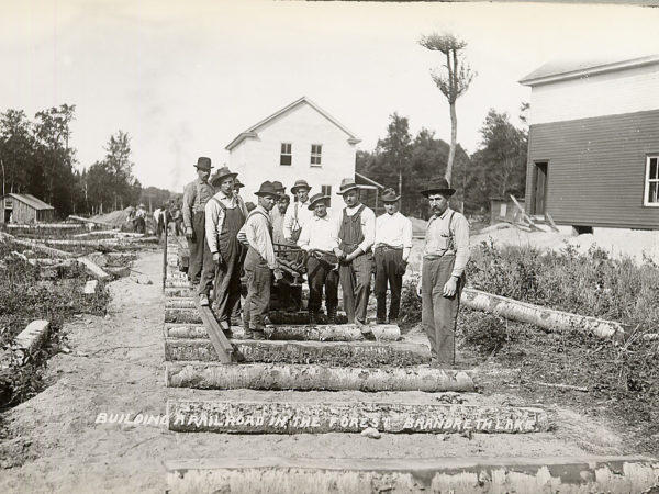 Group of men building a logging railroad in Brandreth Lake