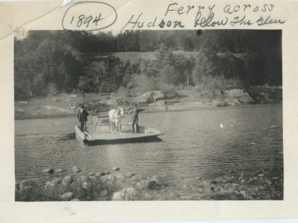 Men and horse on a cable ferry across the Hudson River