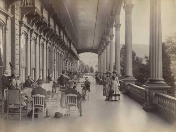 Orchestra performs on the porch of the Fort William Henry Hotel in Lake George