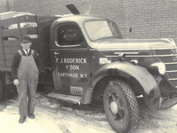 F.J. Roderick with his truck in Carthage